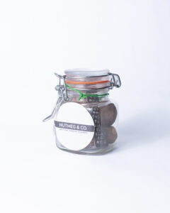 Nutmeg and grater in mini mason jar