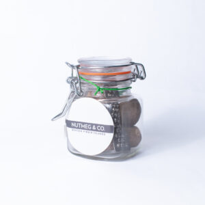 Nutmeg and grater in mini mason jar